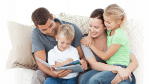 family on couch reading